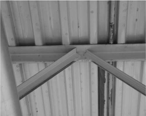 Angle interference with top chord reinforcement